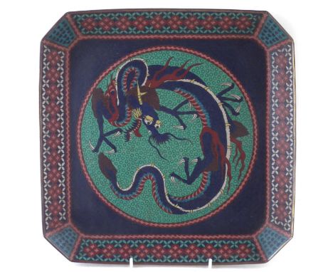 Cloisonné square shape footed dish, probably Japanese decorated with a dragon within floral panel borders, late 19th century 