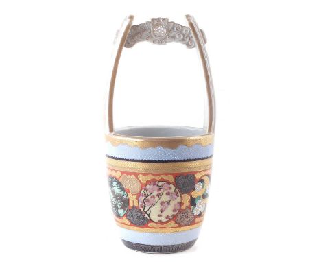 Japanese pail shape vase, with pierced handle, decorated with floral panels and raised enamel work, 20th century 23.5cm high 