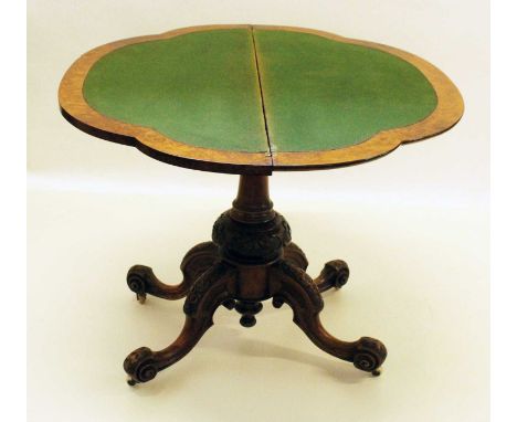 Victorian figured walnut fold-over card table, the semi-circular top with white wood inlay decoration, balustre single column