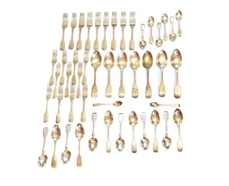 A selection of George IV and later silver flatware, fiddle pattern, with crest to stem, comprising nine dinner forks, eleven 