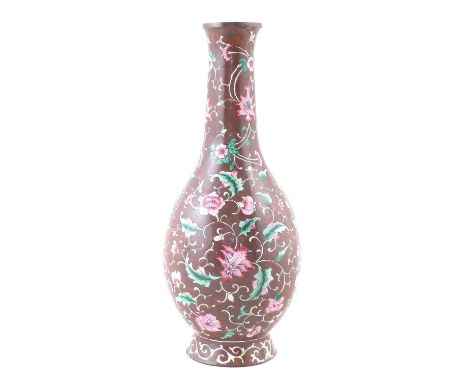 Chinese enamel vase, painted with trailing floral design on a brown ground, 19th century, 26cm high CONDITION REPORT: Damages