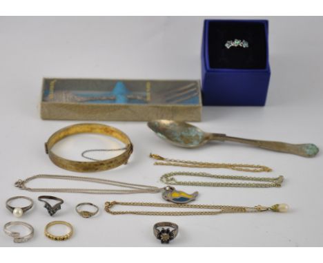 An assortment of silver jewellery, to include various rings, a pendant & chain, and a gilt bangle, together with a small sele