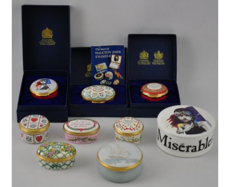 Eight enamelled Halcyon Days patchboxes, together with a Les Miserables souvenir ceramic circular trinket box (9)
