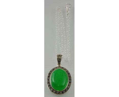 A silver marcasite and jade coloured pendant necklace