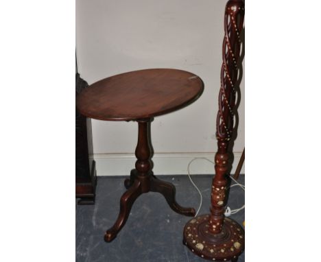 A Victorian mahogany tripod wine table together with a Damascus style standard lamp 