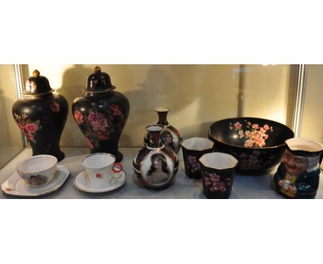 An early 20th Century Carltonware black glazed fruitbowl together with a pair of matching octagonal vases, a pair of Sevies s