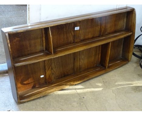 Ercol elm hanging plate rack, length 3' 6", height 19" 