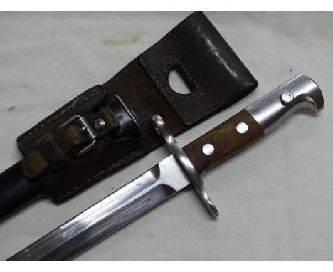 A Swiss bayonet in leather scabbard