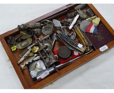 Corkscrew, pocketknives, small padlocks, etc.