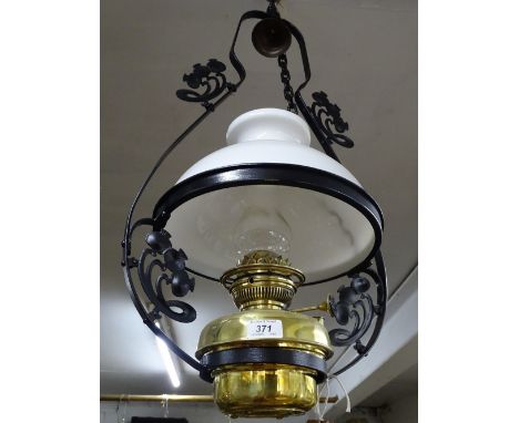 An oil lamp style ceiling light