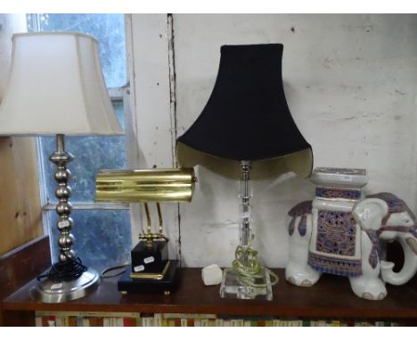 A banker's lamp, 2 table lamps and an elephant