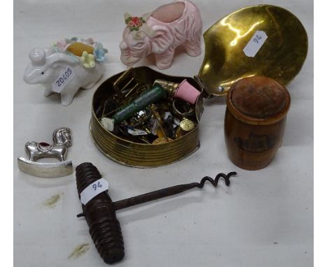 A Mauchlineware pin cushion, corkscrew, etc.