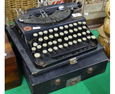 A Remington portable typewriter with carry case