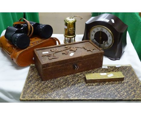 Bakelite cased mantel clock, pair of binoculars, miner's lamp, carved wood box and cribbage board
