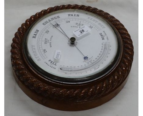 Aneroid barometer and thermometer in rope carved oak case