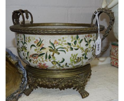 Oriental ceramic fruit bowl on cast metal stand