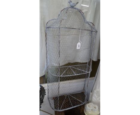 A Wirework wall mounted shelf