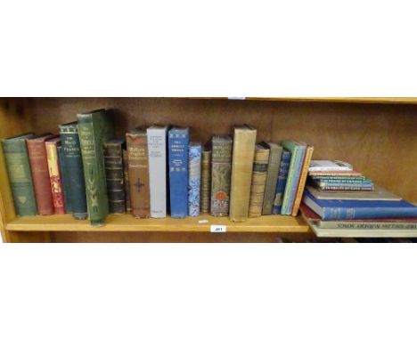 Shelf of various hardback books