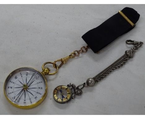 A pocket compass and a miniature compass on chain