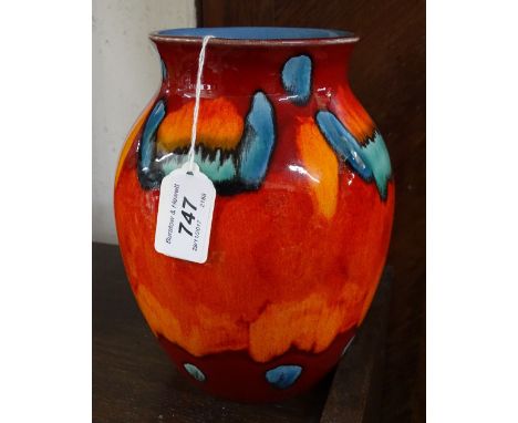 A modern Poole Pottery red and blue glazed vase