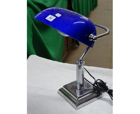 A Lloytron banker's lamp with blue glass shade