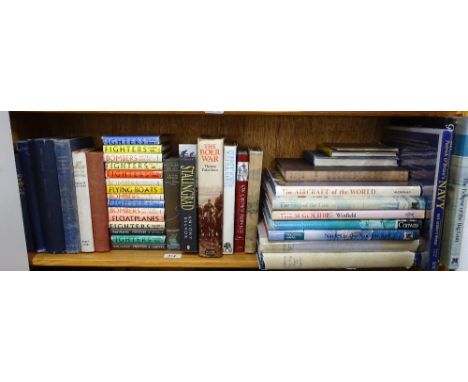 Shelf of books on warfare, etc