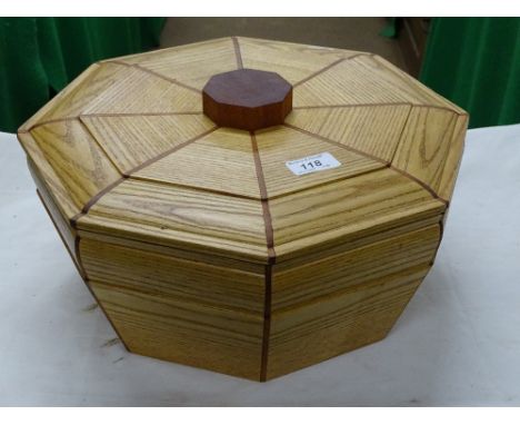 An octagonal light oak box and cover with inlaid decoration