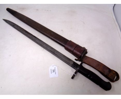 An American Remington bayonet stamped 1913, in scabbard with leather frog