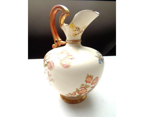 A Royal Worcester blush ivory ewer (height 25cm)