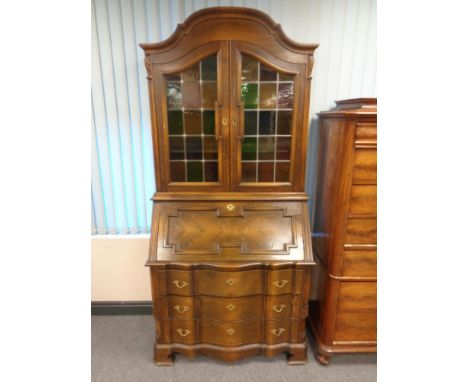 A continental beech stained glass door bureau book case