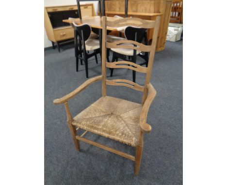 An oak ladder backed chair 