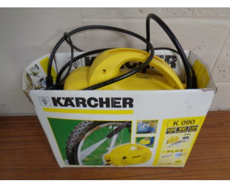 A Karcher K 090 pressure washer with hose and attachments (boxed)