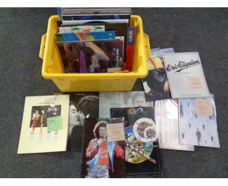 A box of 1980's albums and singles, concert programmes and tickets including John Martyn with ticket stub dated 28 October 19