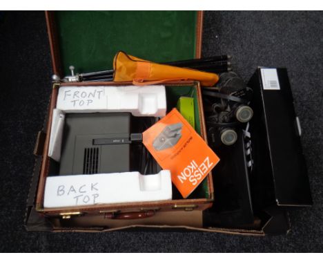 A box containing boxed projector and screen, pair of boots, 10x50 binoculars etc