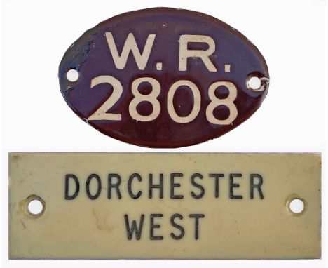 Ivorine Shelf Plate DORCHESTER WEST, together with a small oval enamel Advertising Hoarding Plate GWR 2808. (2 items)