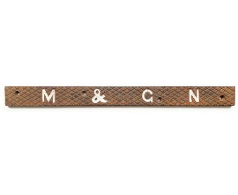 M&amp;GN cast iron Signal Box Step tread measuring 23.75in x 2in, letters picked out in white otherwise unrestored.