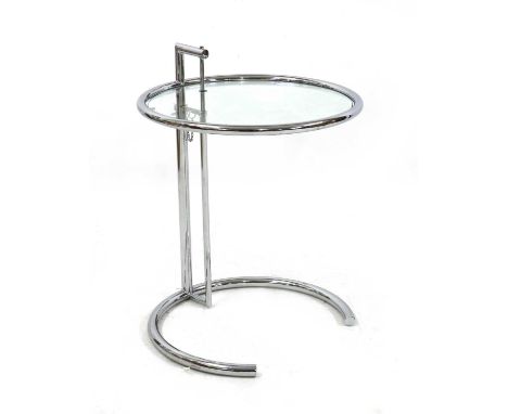 An Eileen Gray style lamp table, the adjustable circular glass top on tubular supports, 51cm diameter  63cm highTwo rubber wa