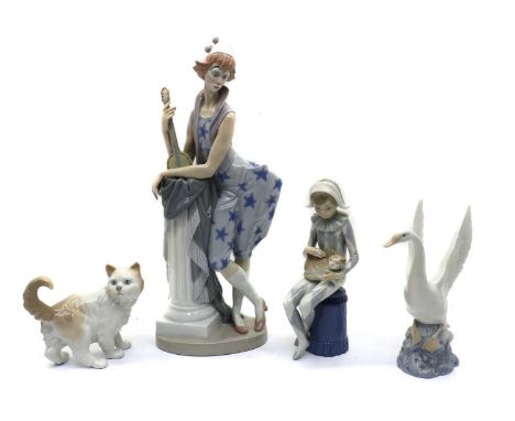 A collection of four Nao porcelain figurines,late 20th century, modelled as a female clown with a guitar leaning against a pi