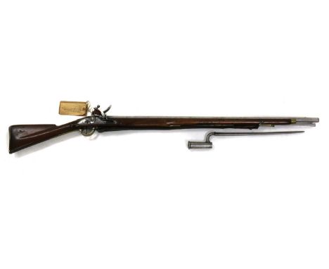 A flintlock 'Brown Bess' Tower musket, 19th century, with 39.5in steel barrel, lock stamped Tower, the walnut stock with 1800