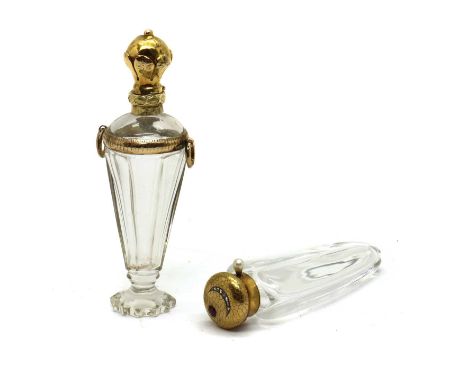 A French gold mounted and glass scent bottle, the hinged cover mounted with a half-moon of diamonds and a ruby 'star', on a f