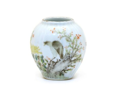 A Chinese porcelain jarlet, of ribbed ovoid form, painted with a bird standing on a rock by chrysanthemum and other flowers, 