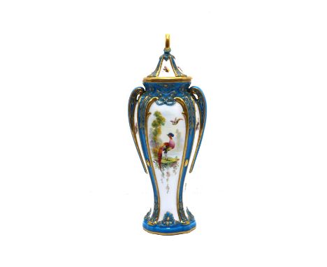 A Royal Worcester porcelain vase and cover,c.1907, the sloped cover with a pierced finial, over a tapering body with integral