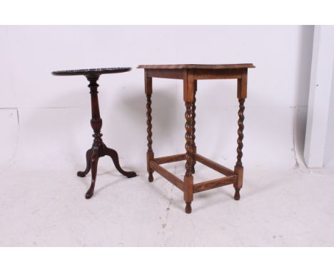 A good quality mahogany tripod wine table raised on splayed legs with turned column, circular top. Together with a barleytwis