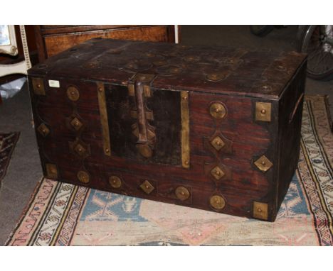 A 20th century brass decorated Indian trunk. 40cm x 80cm x 42cm.