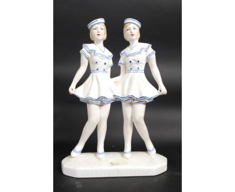 A 20th century ceramic art deco style figurine of two sailor girls