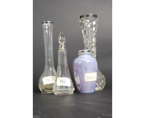 A collection of silver hallmarked collar cut glass to include 3 vases ( one porcelain ) each with hallmarked collars  togethe