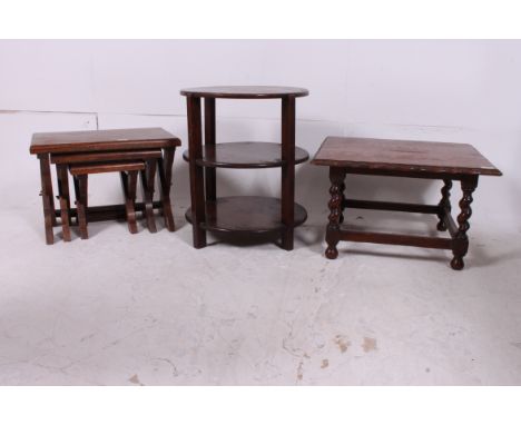 A pine eclesiastical style nest of tables in the arts and crafts style together with a 3 tier 1930's oak side table and a bar