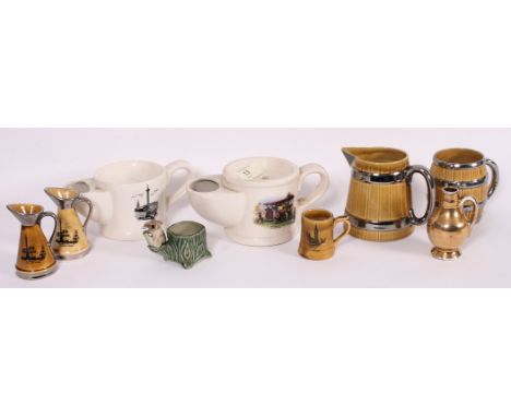 A pair of Wade shaving cups, one with traction engine interest together with Wade barrel mugs. Measures: 9cms H x 19cms W.