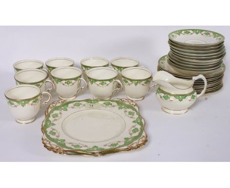 A 1930's Tuscan China ' Plant ' part tea service to include cups, saucers, sandwich plate etc. Measures: 23ms plate 