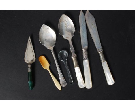 A silver hallmarked stilton spoon by Lanson Ltd bearing Birmingham hallmarks for 1920. Weight 15.6g. Together with another si